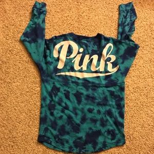 Pink tie-dye varsity crew sweater